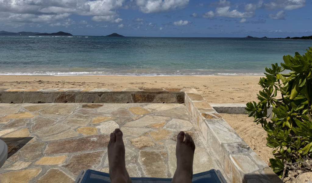 Looking out over a beautiful beach - and my feet